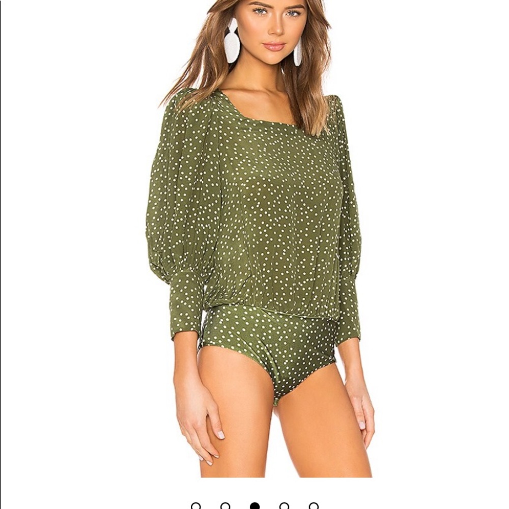Adriana Degreas designer Melle bodysuit in green.